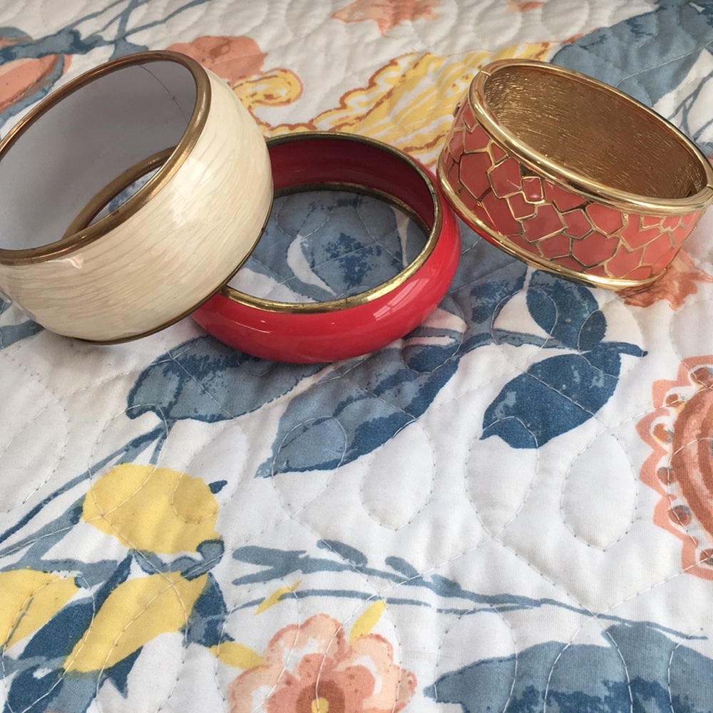 SET OF THREE. Gold rimmed, wide width bracelets.